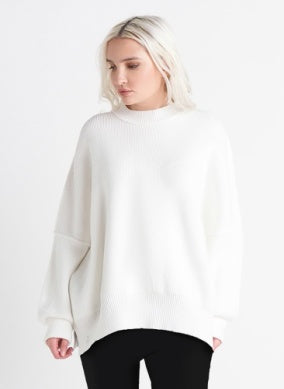 EXPOSED SEAMS TUNIC SWEATER